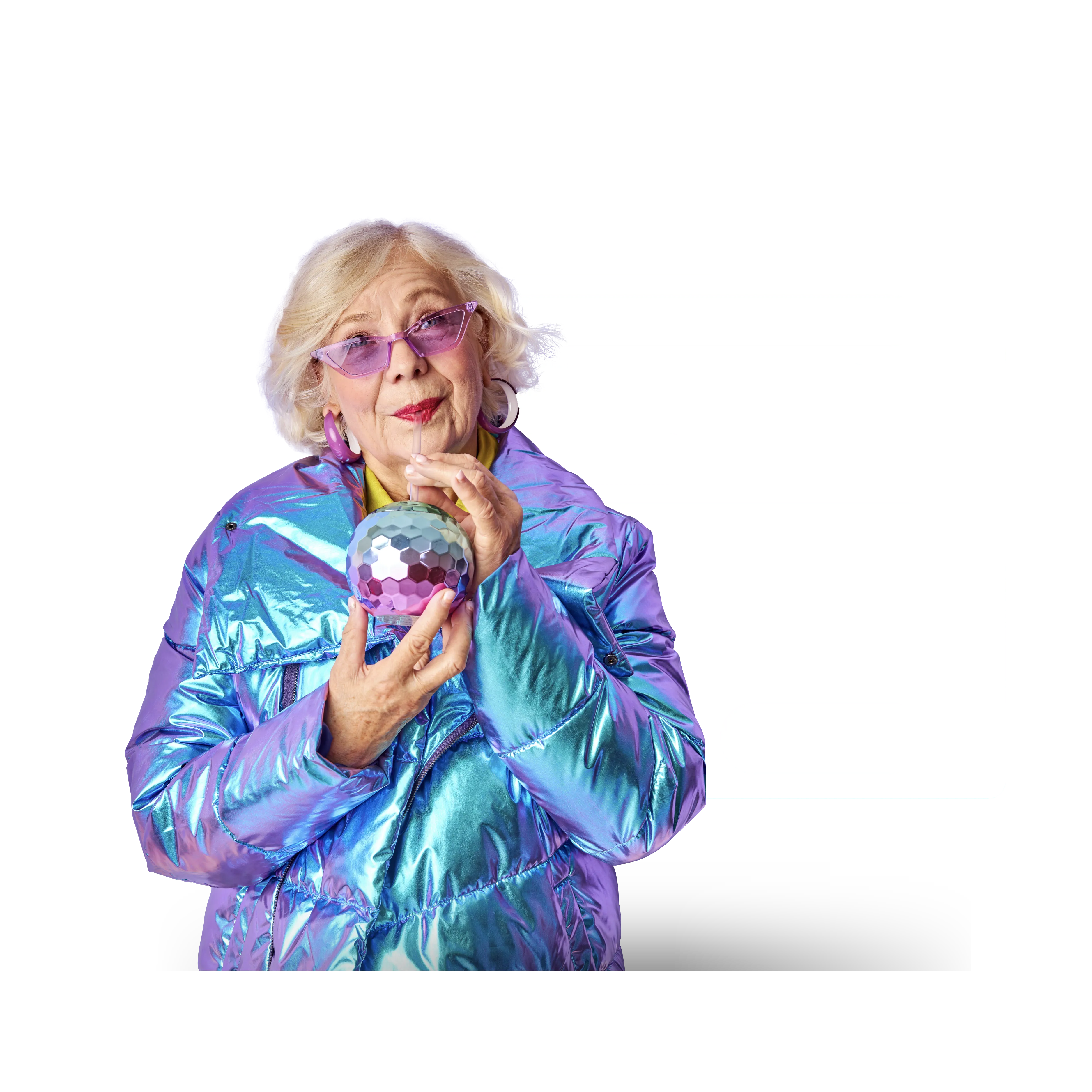 older lady with colorful jacket and demographic behind her