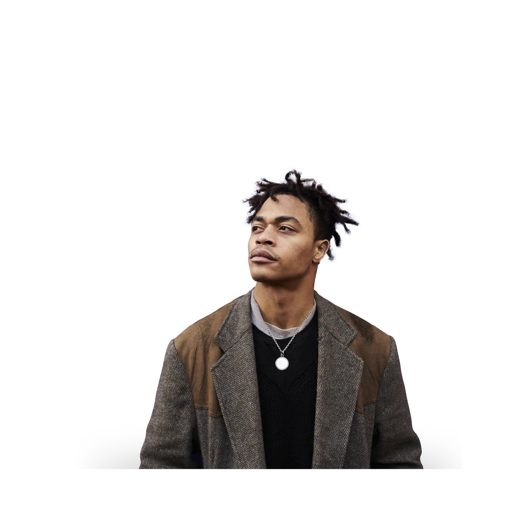 man with brown blazer and data in the background
